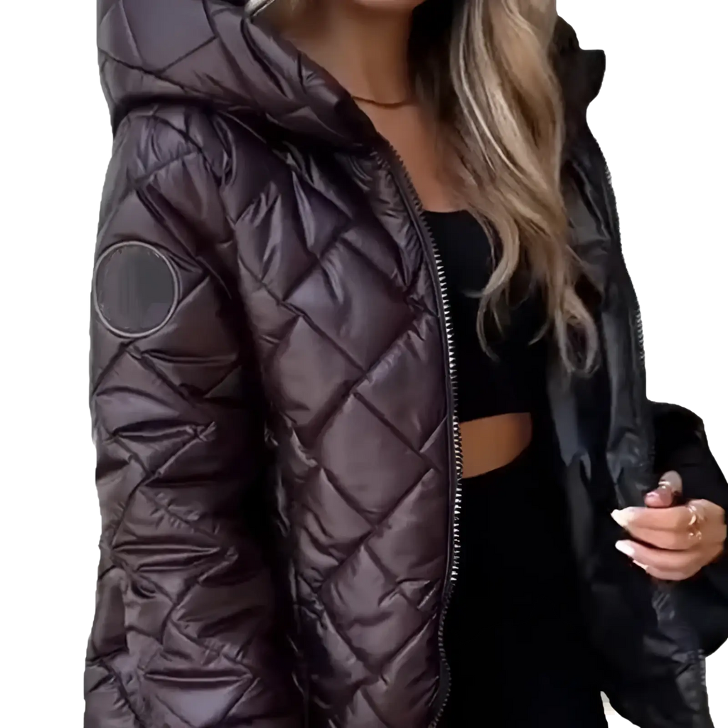 Black lightweight hooded puffer jacket with quilted shiny water-resistant fabric and circular patch on left sleeve