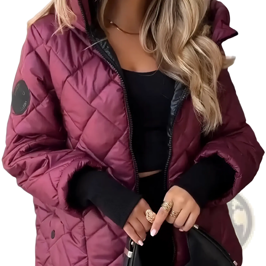 Women lightweight hooded puffer jacket in maroon quilted fabric with black inner lining and circular sleeve patch