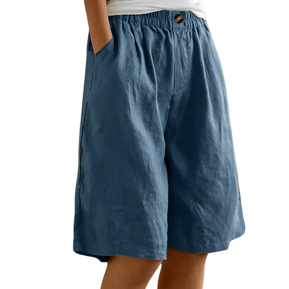 Women linen bermuda shorts in blue with elastic waist, decorative button, and comfortable pants length and leg opening