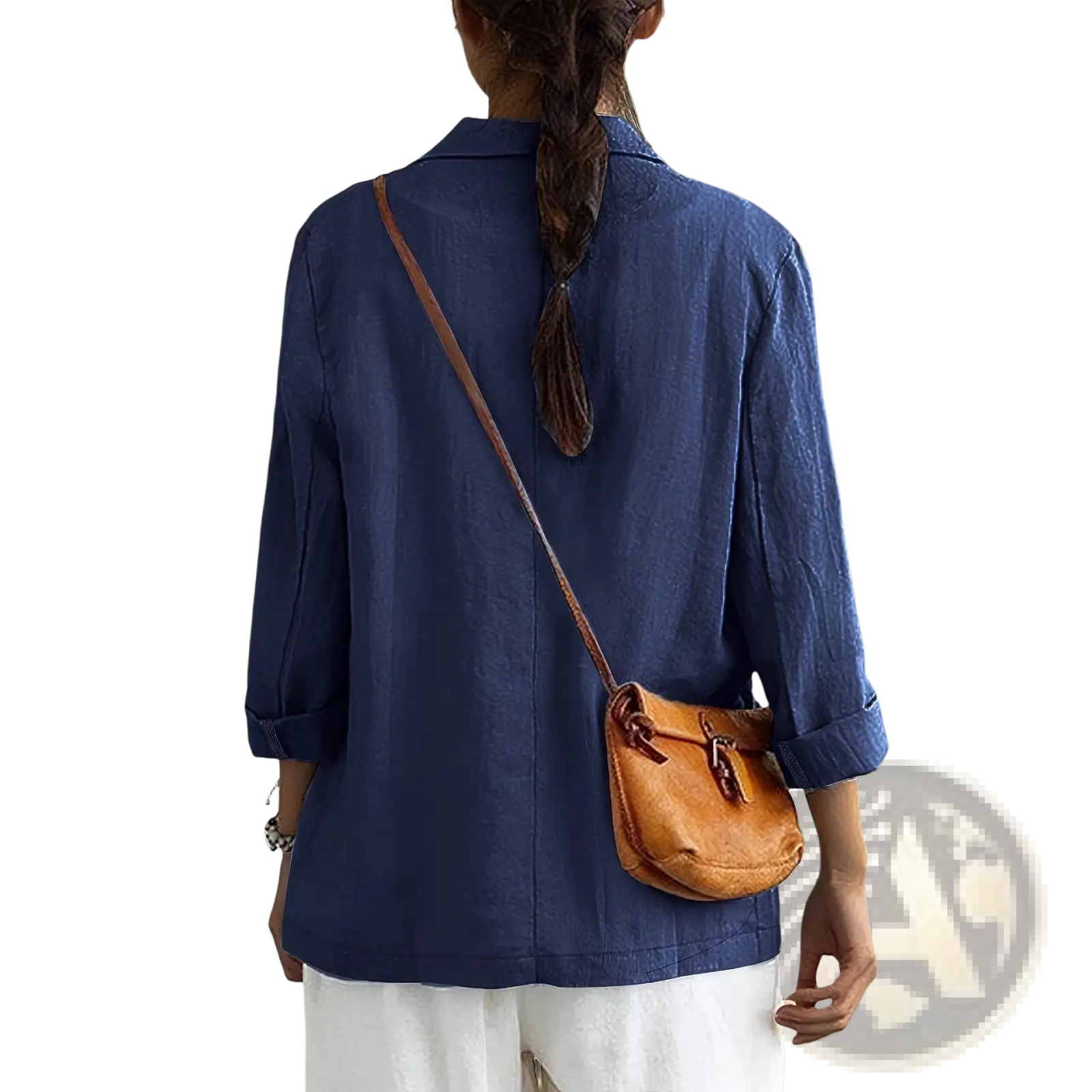 Tan leather crossbody bag with flap closure and adjustable strap paired with women linen blazer casual workwear jacket