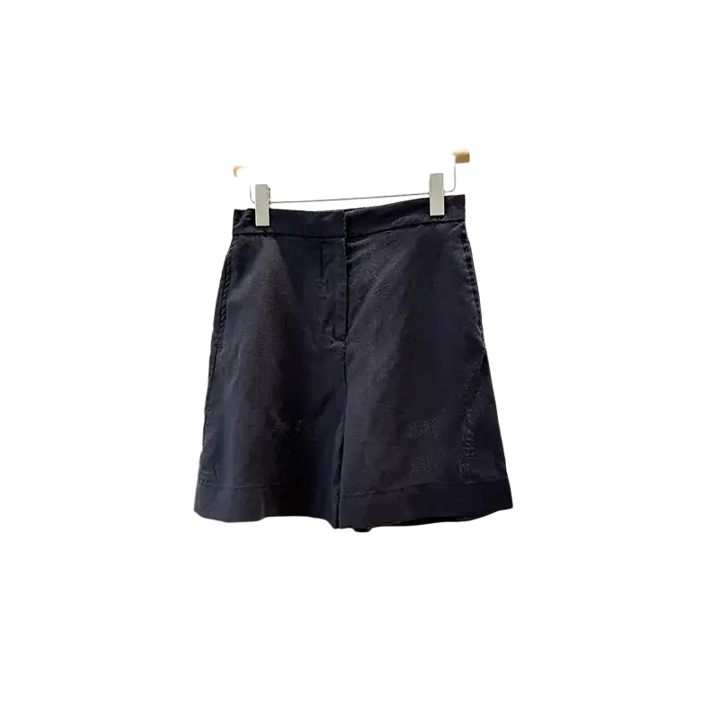 Dark navy blue high-waisted linen shorts with tailored fit and subtle stitching complementing a women linen short sleeve shirt