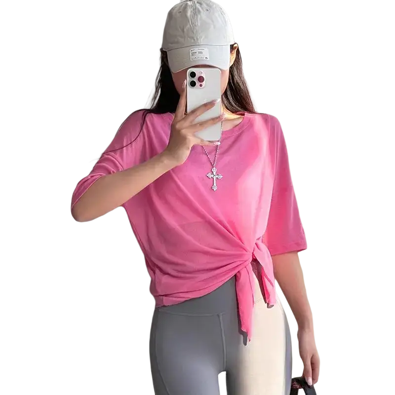 Women long sleeve athletic top in pink with short sleeves knotted front and side slit for activewear use