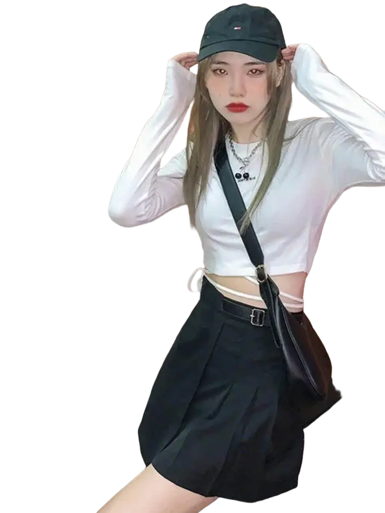 Black crossbody bag with sleek minimalist design and sturdy buckle strap paired with women long sleeve crisscross crop top
