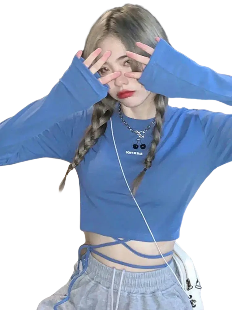 Blue long sleeve crisscross crop top with front graphic and side ties made from soft fabric for women