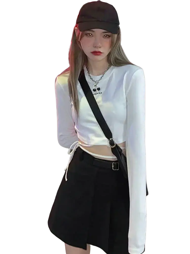 White long sleeve crisscross crop top with side tie detail made from lightweight fabric for women