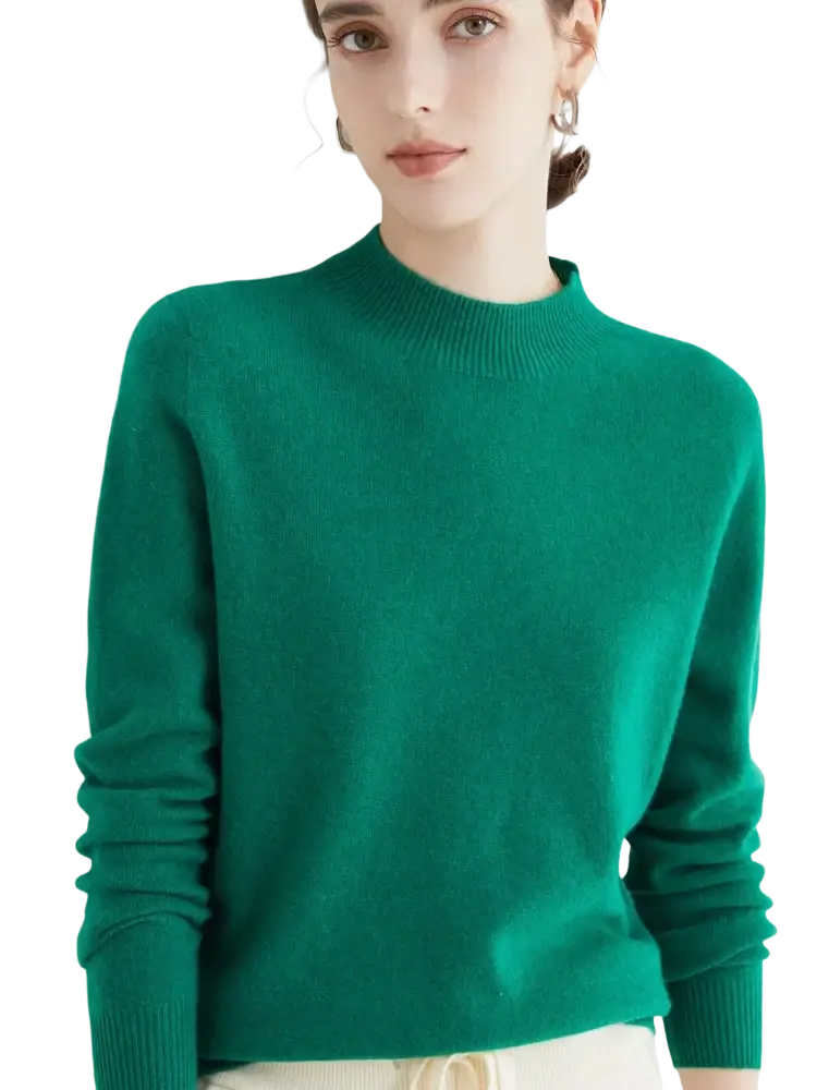 A rich emerald green women merino wool long-sleeved sweater with ribbed crew neckline and cuffs