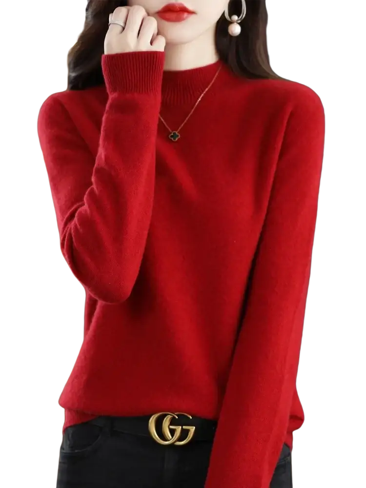 A vibrant red women merino wool half high collar sweater with long sleeves and a soft knit texture