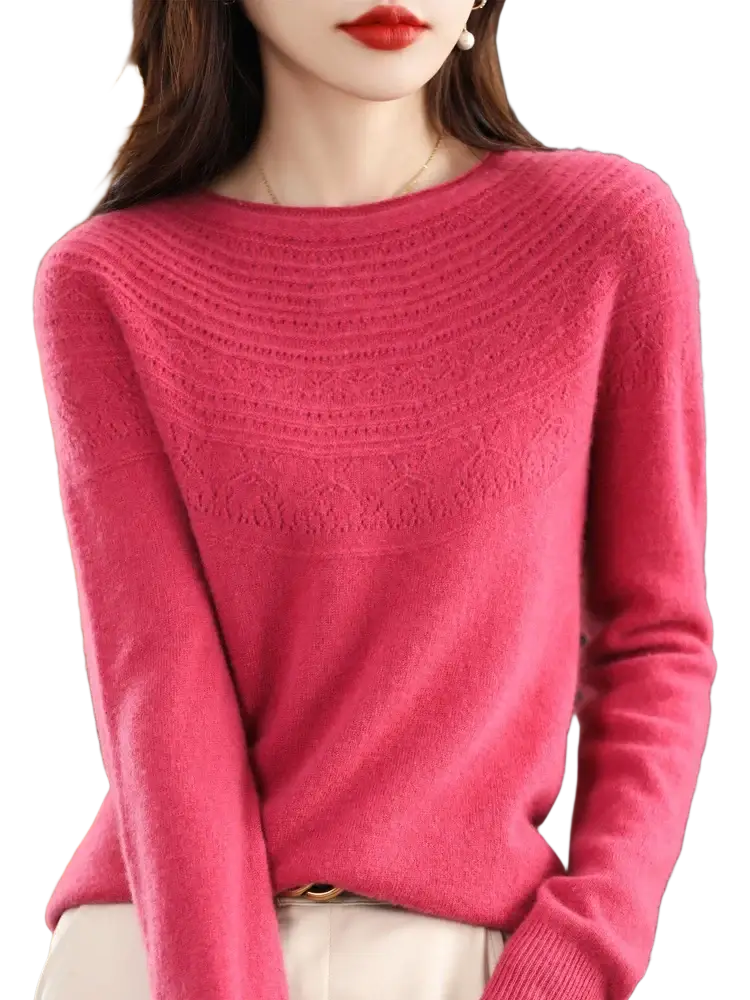 Women merino wool o-neck sweater in soft vibrant pink with a textured chest pattern and ribbed cuffs