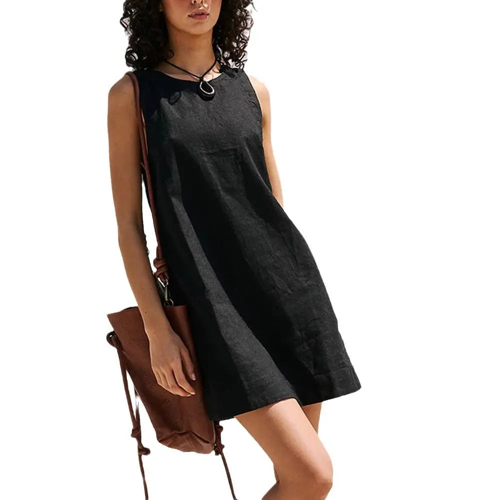 Black sleeveless backless linen mini summer dress with relaxed fit and subtle texture