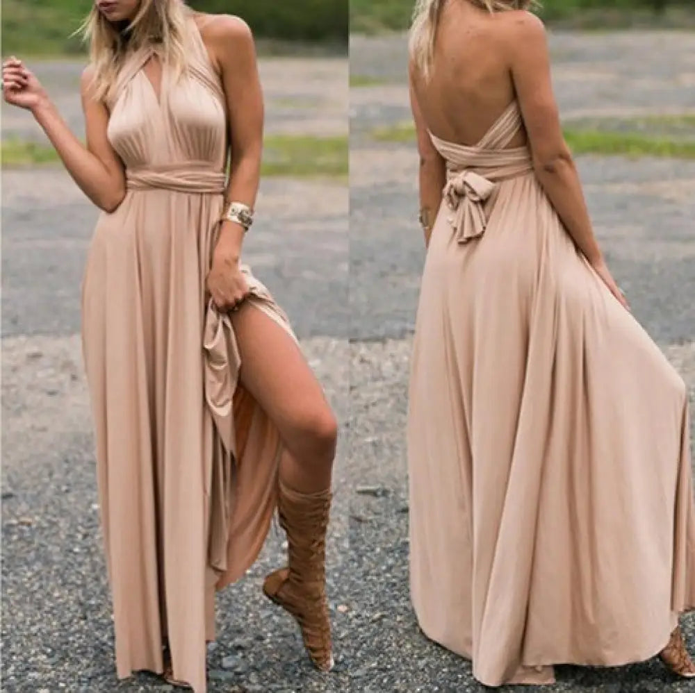 Beige satin multiway halter neck maxi party dress with draped back and side slit shown from the back side