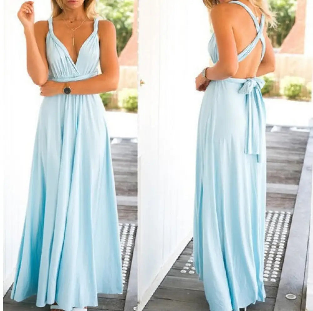 A flowing light blue satin multiway halter neck maxi party dress with deep v-neckline and crisscross back straps