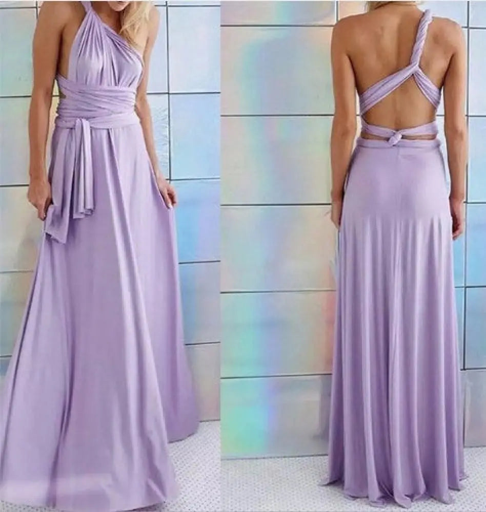A flowing lavender satin multiway halter neck maxi party dress with a draped neckline and open back tied with straps