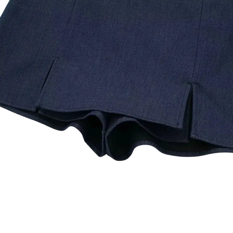 Women navy blue pleated shorts with belt in dark blue denim featuring a subtle textured weave and gently flared hem