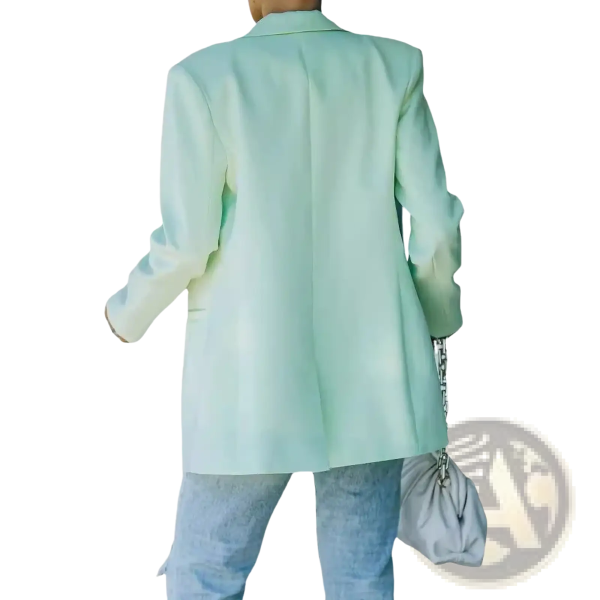 A soft mint green oversized women blazer with relaxed fit and long sleeves for casual office wear
