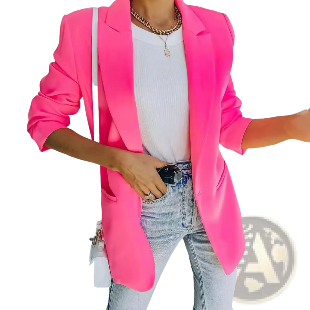 A vibrant pink oversized women blazer with a sleek tailored fit and notched lapels for casual office wear