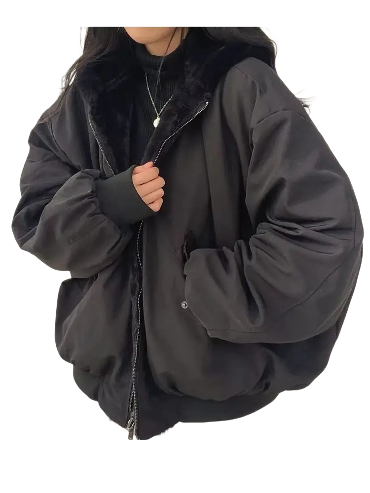 Black oversized double sided hooded parka jacket with plush fur lined hood and quilted puffer design for women