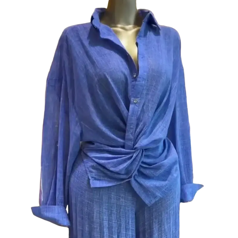 Women pleated wide leg pant set with vibrant blue long-sleeved textured button-up shirt featuring front knot detail