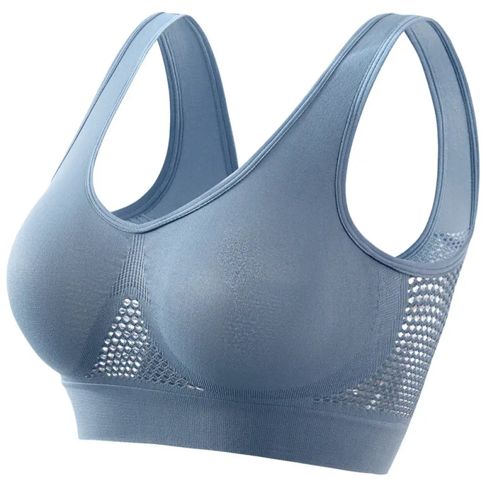 A sleek light blue seamless plus size sports bra with breathable mesh panels and moisture wicking fabric