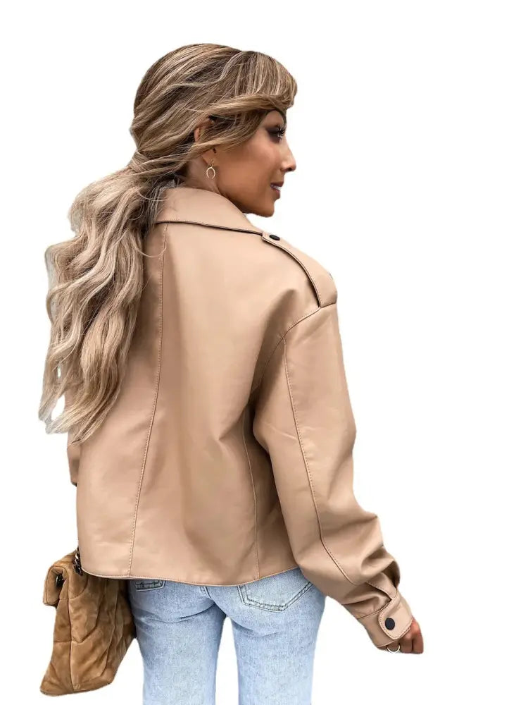 Women’s relaxed beige faux leather jacket with classic collar buttoned cuffs and functional pockets