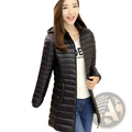Black quilted slim fit hooded puffer jacket for women made of cotton offering warmth and style