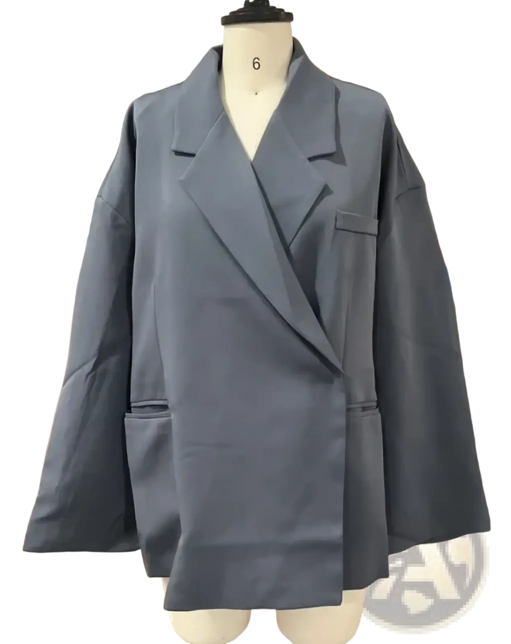 Women red patent leather tote bag shown with a gray blazer featuring relaxed fit, structured lapels, and two front pockets