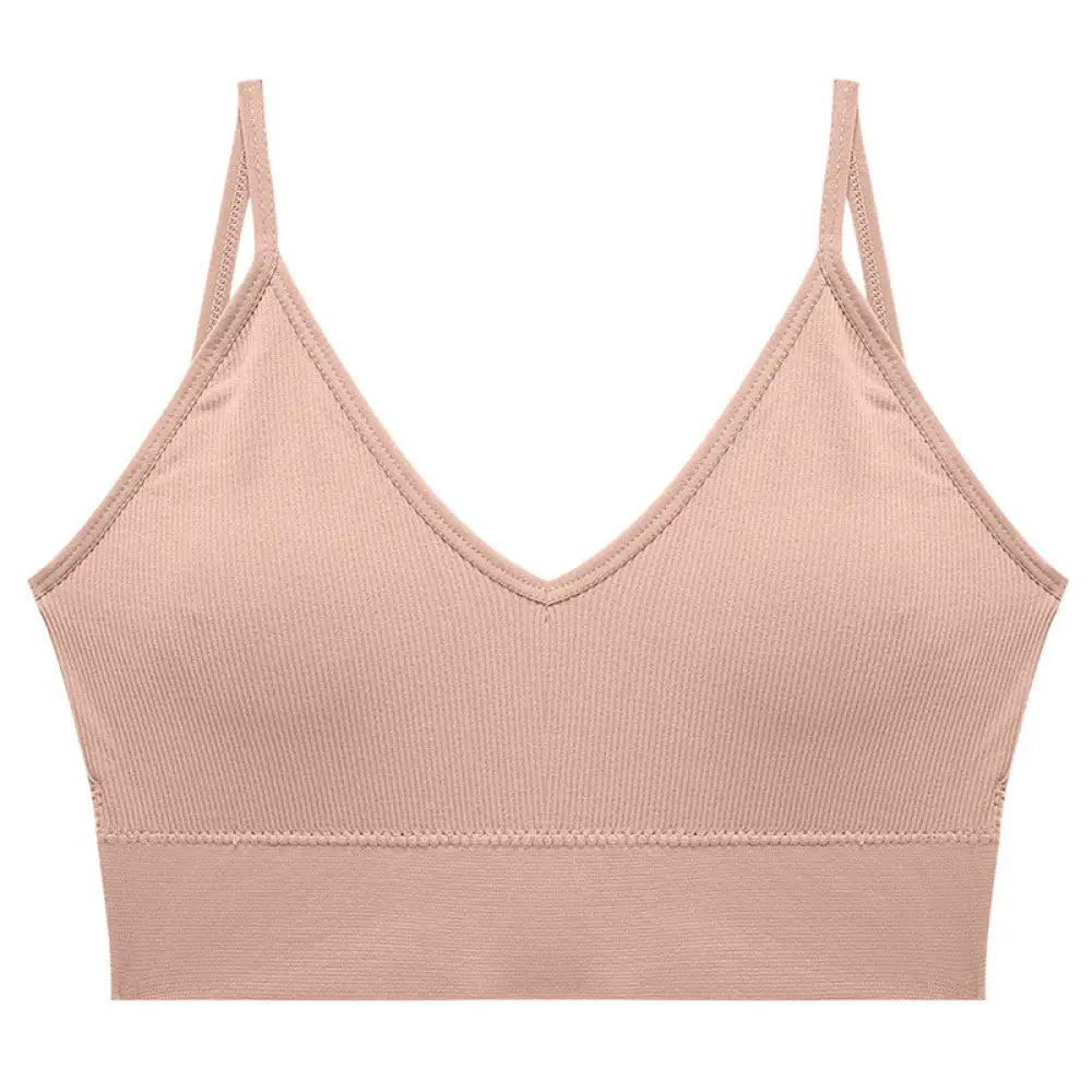 Beige seamless v neck ribbed tube top bra with adjustable thin straps made from ribbed fabric for comfortable support