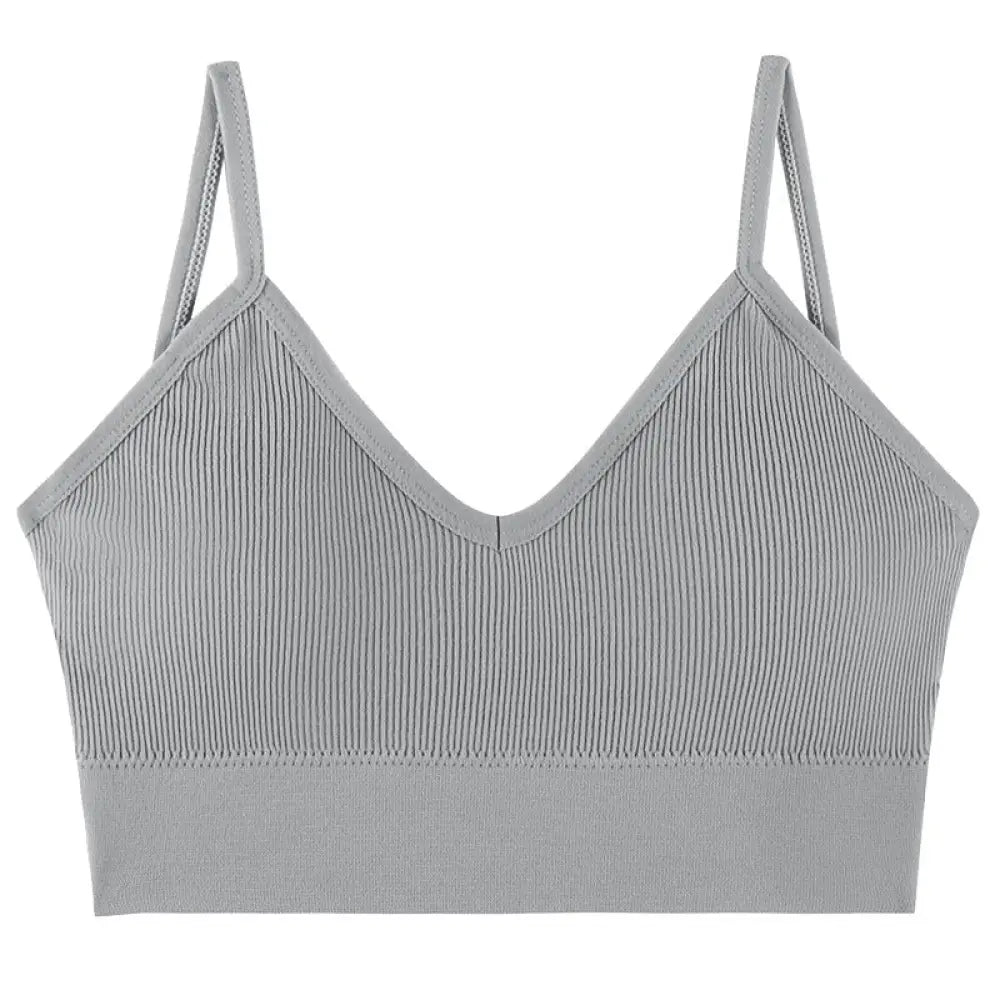 Gray seamless v neck ribbed knit sports bra with thin adjustable straps designed for comfort and support