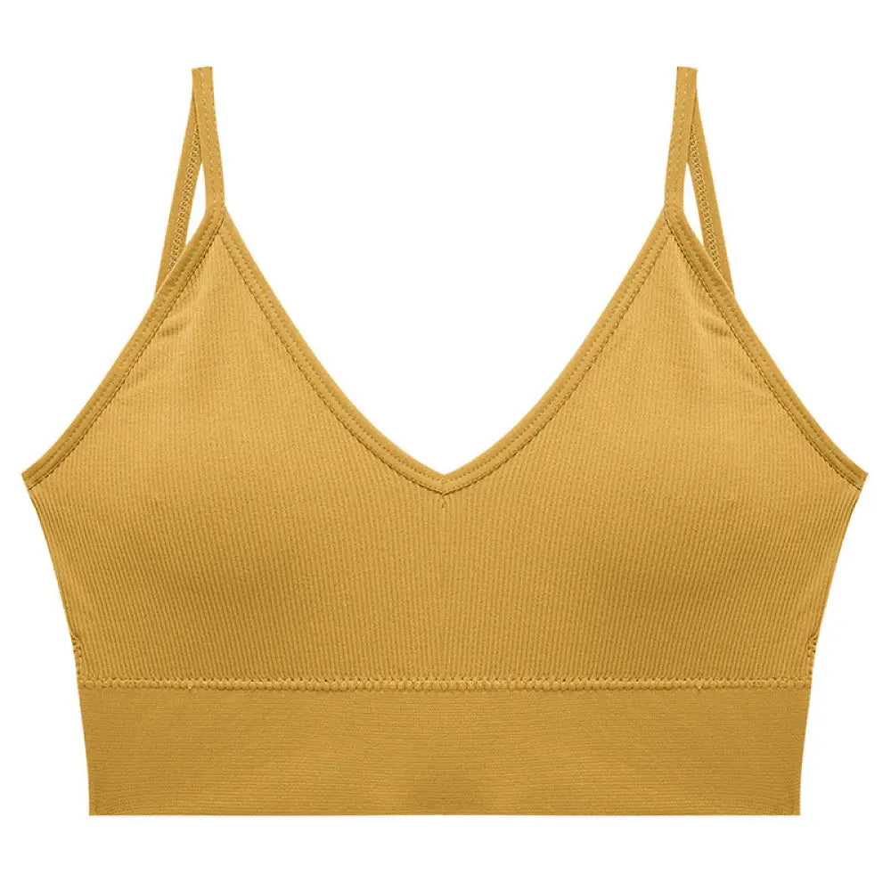 Mustard-yellow seamless v neck ribbed knit sports bra with thin adjustable straps for comfortable support