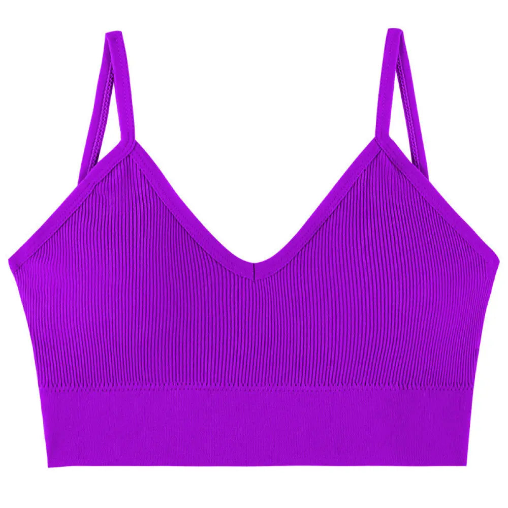 Vibrant purple seamless v neck ribbed knit sports bra with thin adjustable straps for comfortable wear