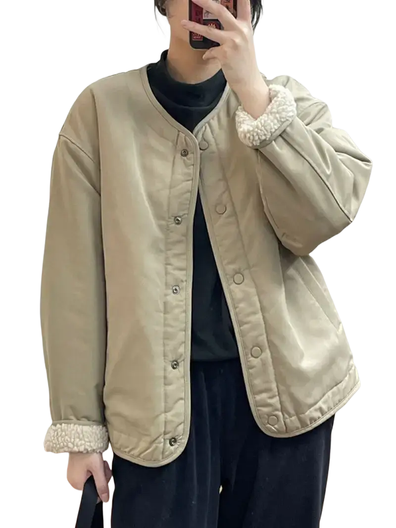 Beige women shearling bomber jacket with quilted design and fluffy white shearling cuffs and collar