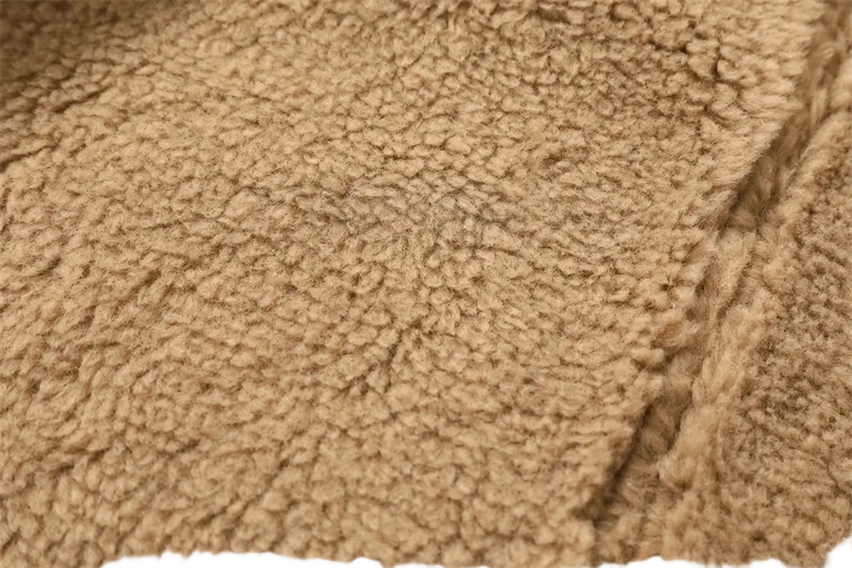 Tan women shearling bomber jacket brown fleece coat with plush fleece fabric and visible stitching along the seam