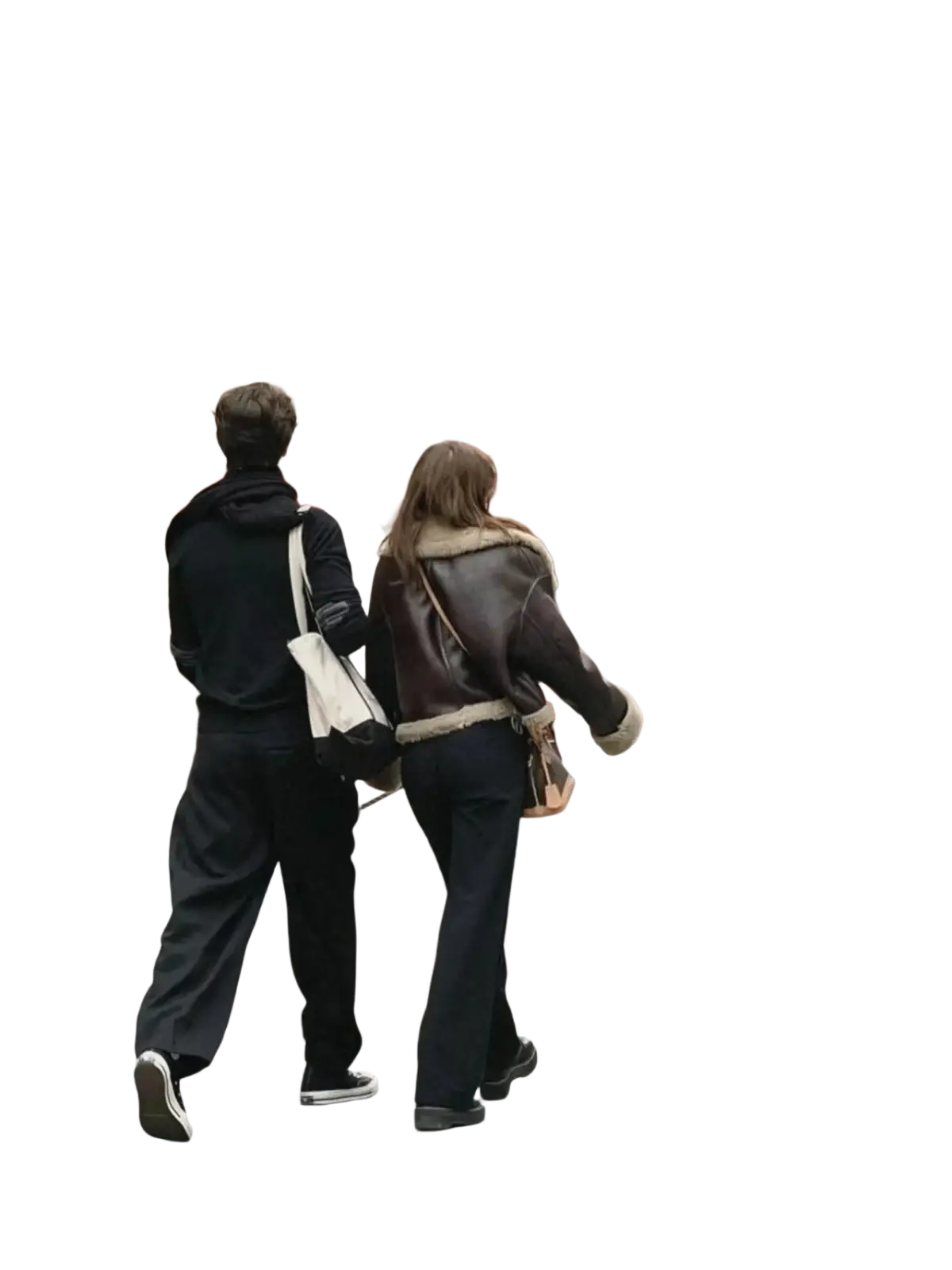 White canvas tote bag with black straps worn over shoulder shown with women shearling bomber jacket brown fleece coat