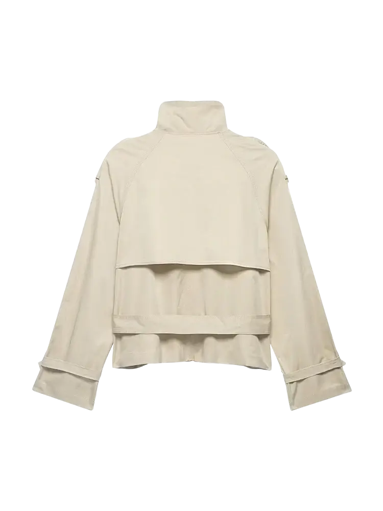 Women short beige trench coat with layered structured design and rolled cuffs made of lightweight fabric