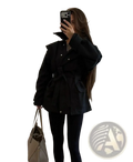 Black belted women short beige trench coat with oversized sleeves and structured shoulders in a utility jacket style
