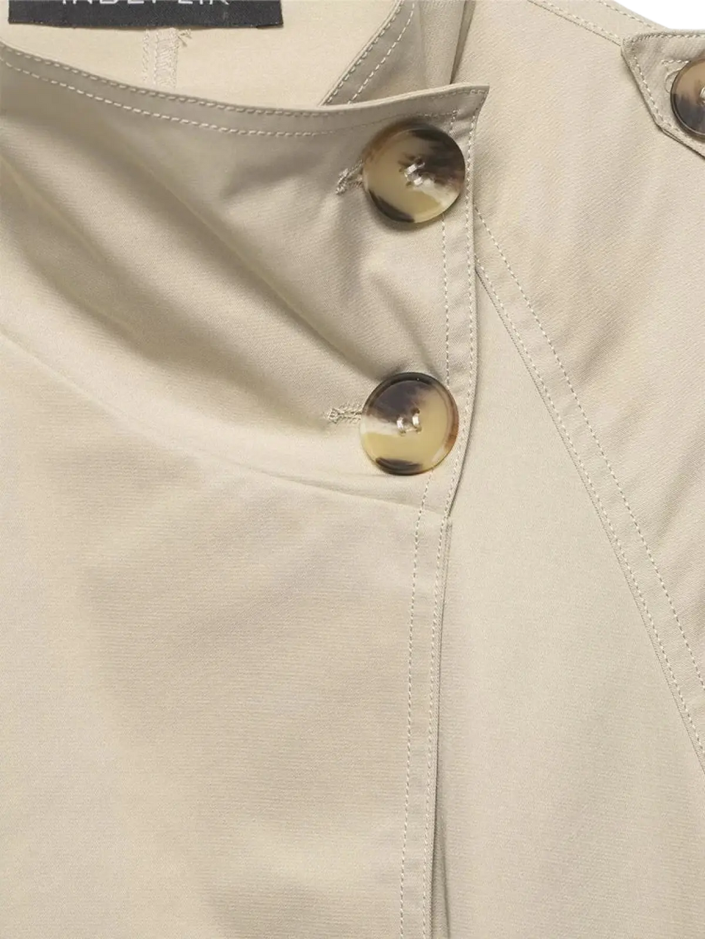 Women short beige trench coat featuring gold-toned buttons and neat stitching in a classic design