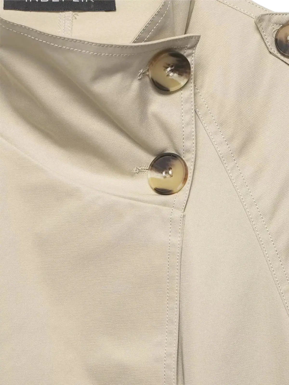Women short beige trench coat featuring gold-toned buttons and neat stitching in a classic design