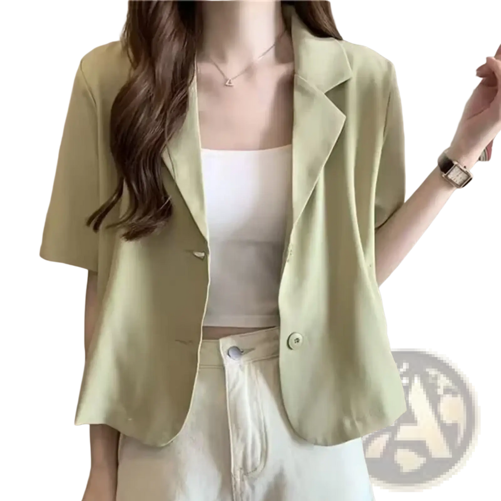 A light green short sleeve blazer in Korean style with subtle button details and a modern sleek design