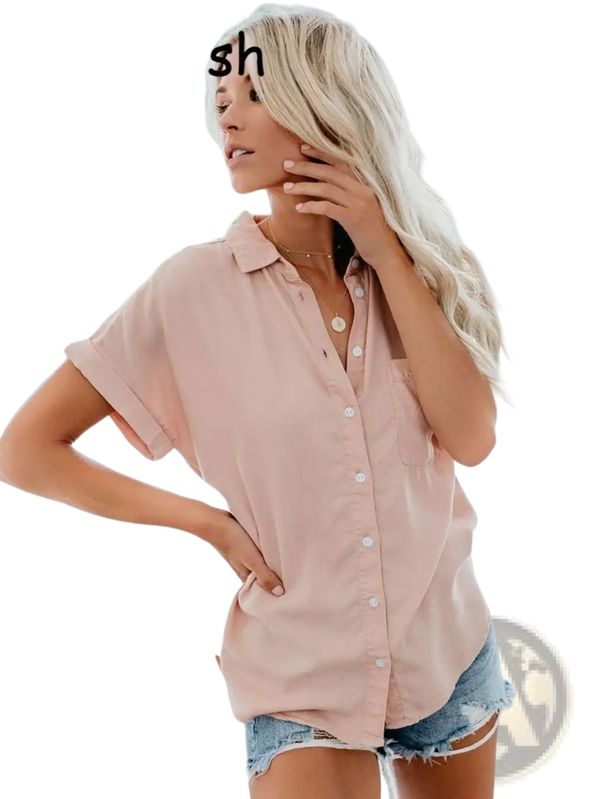 A soft blush pink women short sleeve button up blouse with classic collar and front buttons made of lightweight fabric