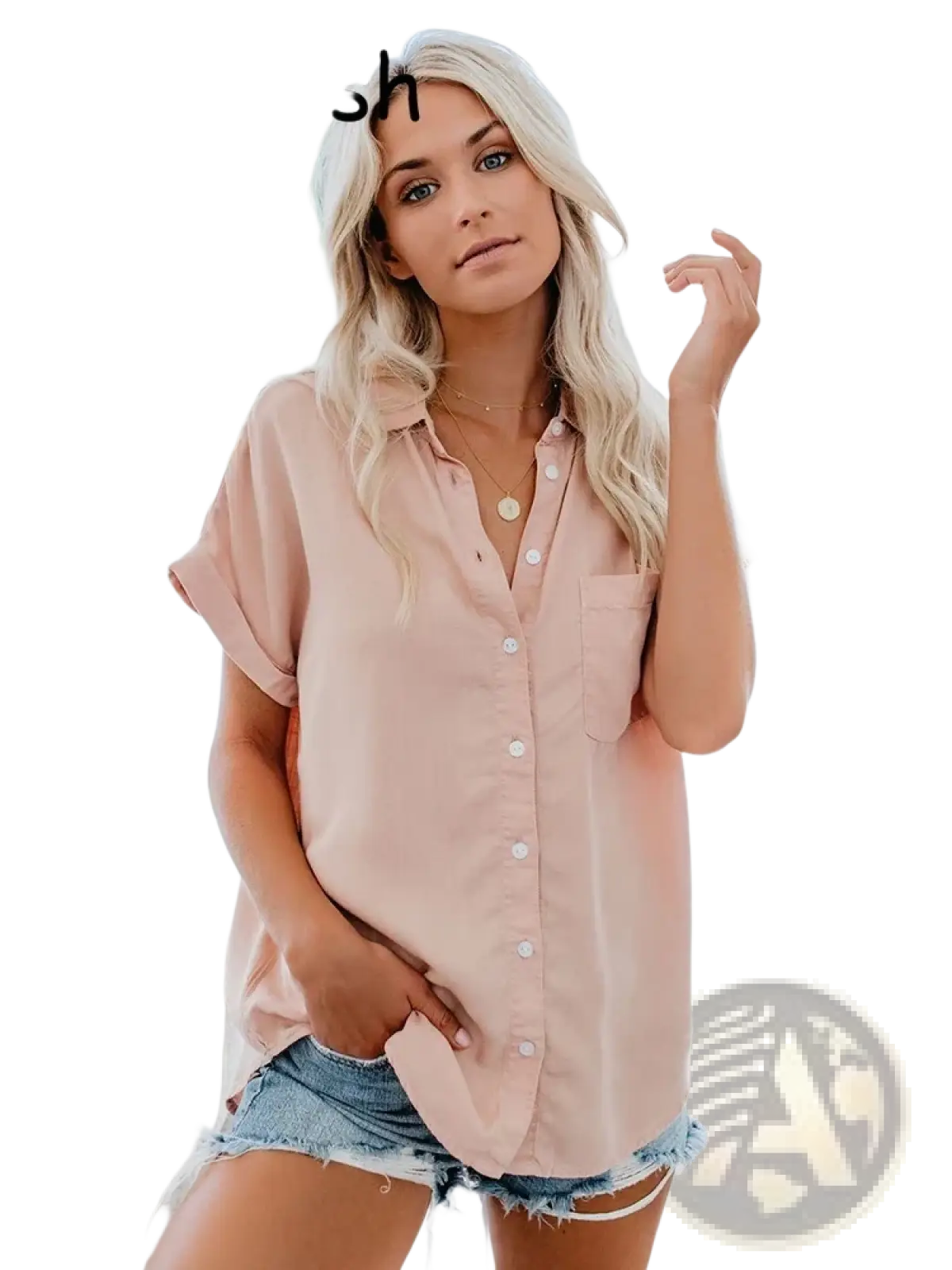 Women short sleeve button up blouse in soft blush pink featuring a chest pocket and rolled cuffs
