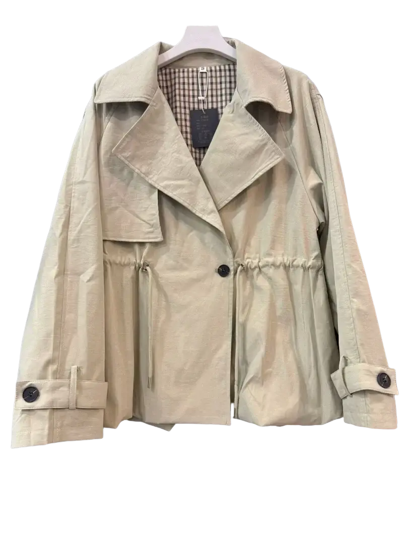 Beige women short trench coat with belted waist black buttons and checkered lining for spring jacket use