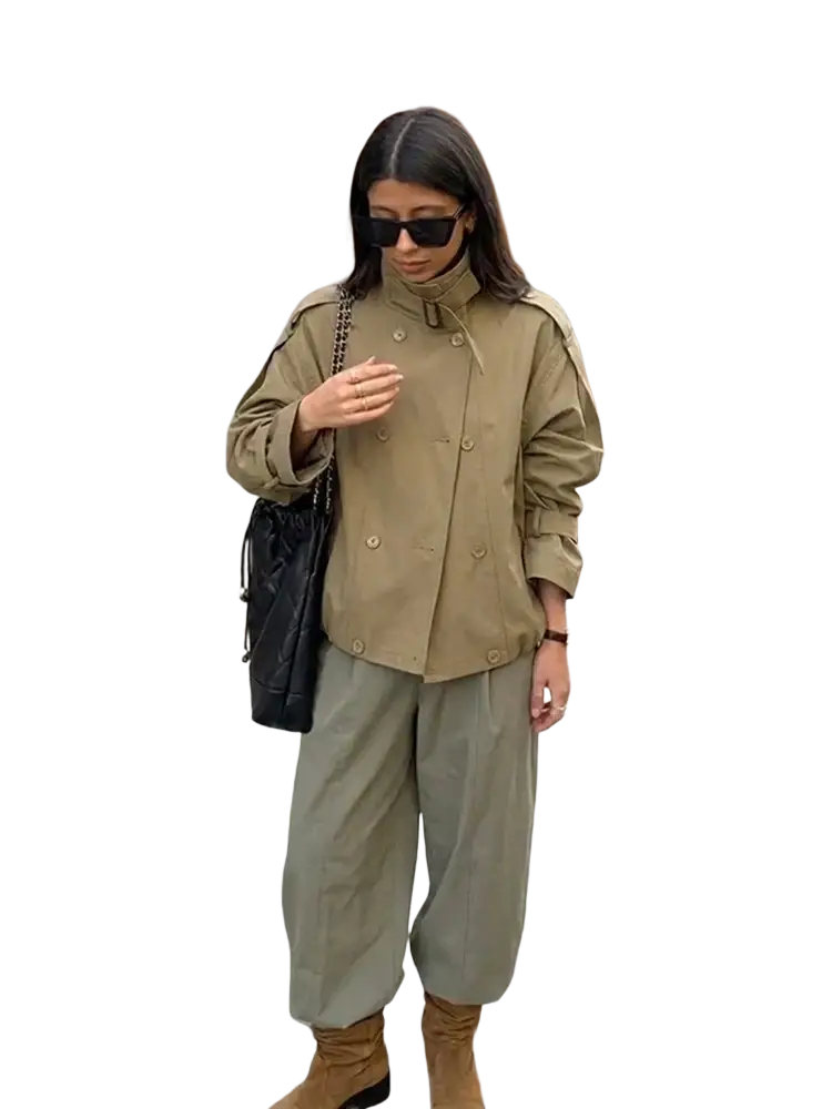 Women short utility trench jacket in olive green featuring a double-breasted design with buttoned cuffs and high collar