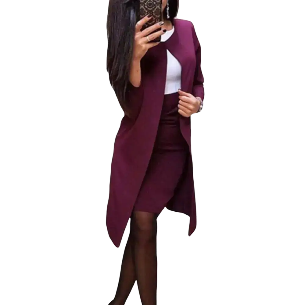 A sleek burgundy long coat with asymmetrical hemline and tailored fit in a women skirt suit office business formal set