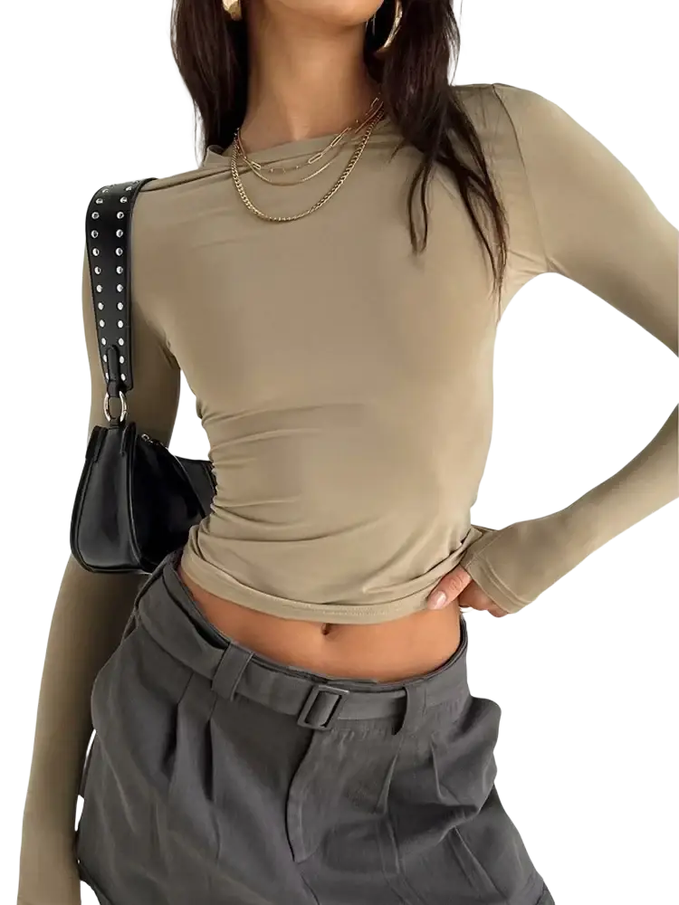 Women slim fit ruched long sleeve crop top in beige sheer form-fitting fabric with ruched waist detailing