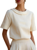 Women solid color short sleeve versatile top in cream with a soft structured collar and smooth fabric