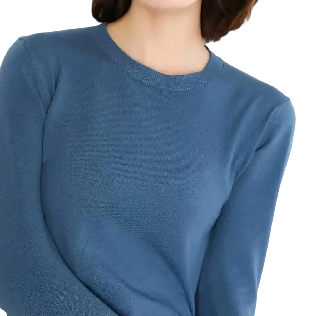 A women solid knit pullover sweater in soft blue with a classic crew neck and long sleeves