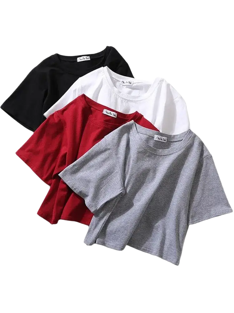 Four solid short sleeve crop tops in black white red and heather gray displayed overlapping casual cotton t-shirts