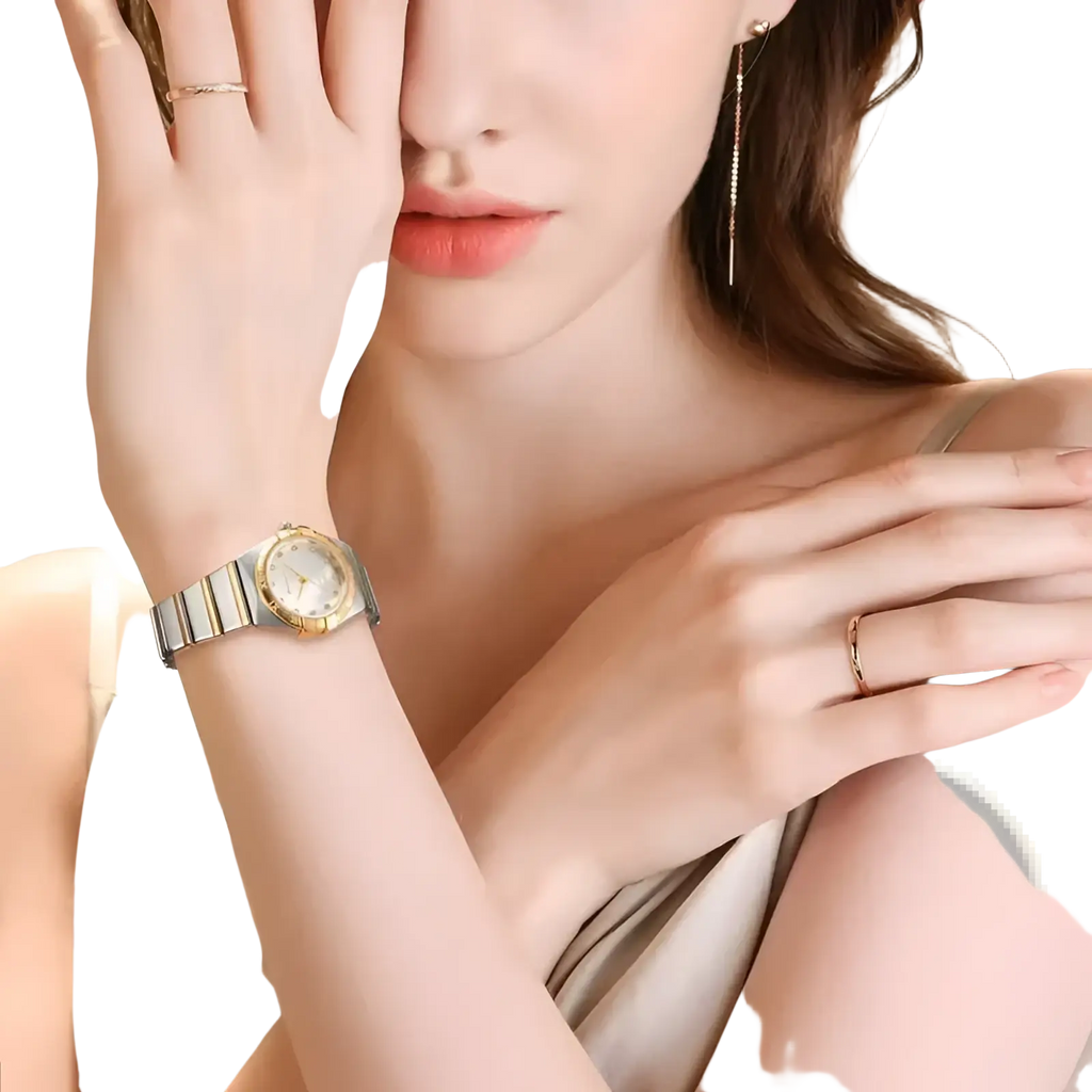 A sleek two-tone stainless steel and gold omega women stainless steel quartz watch with a pink dial and round face