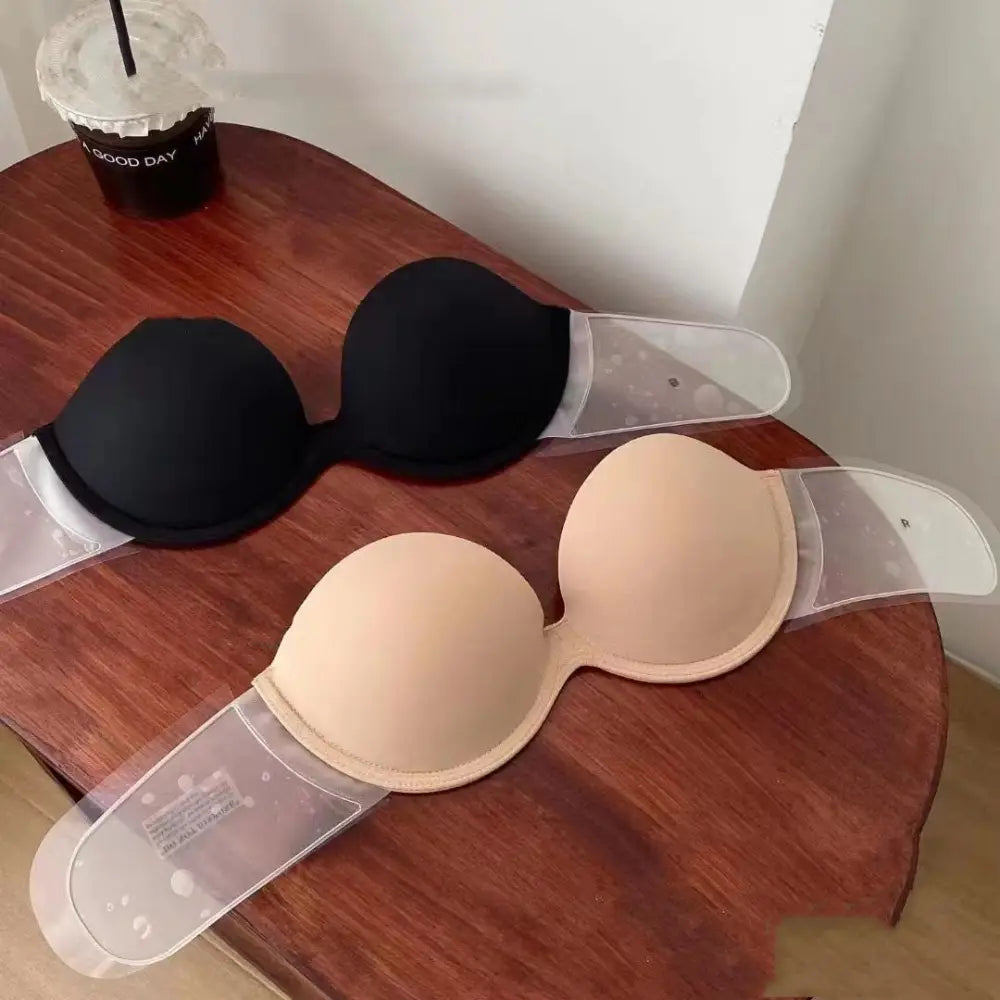 2-pack adhesive strapless push up bras in black and beige with transparent adhesive strips for seamless wear