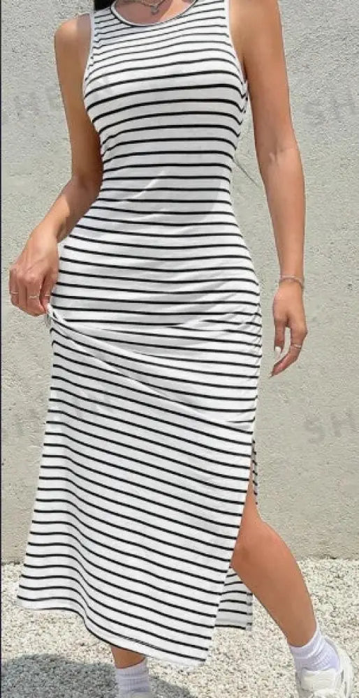 Striped backless knit midi dress with side slit featuring sleeveless black and white horizontal stripes