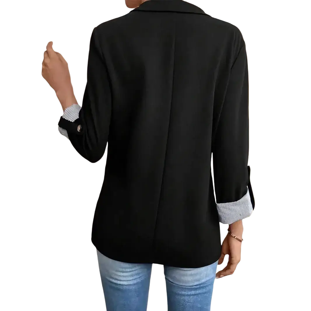 Black single button women blazer with rolled-up sleeves revealing striped cuffs, suitable for formal wear